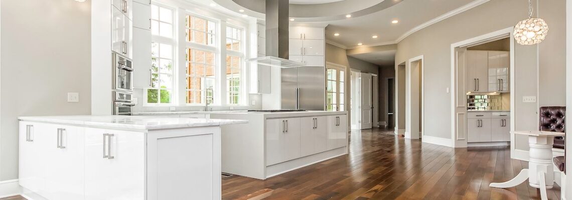 white quartz countertops paired with white kitchen cabinets