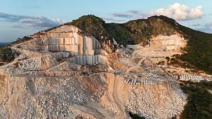 marble quarry with large stone blocks being extracted and cut