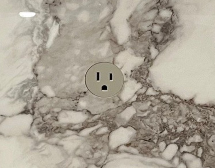 Prado flush outlet installed in stone backsplash Columbus Ohio luxury kitchen