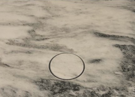 Pop-up outlet flush and hidden in a stone countertop by Impact Countertops Columbus
