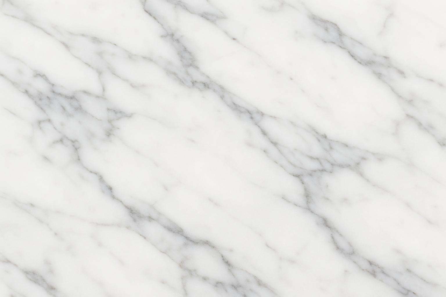 White marble countertop surface with natural veining in luxury kitchen