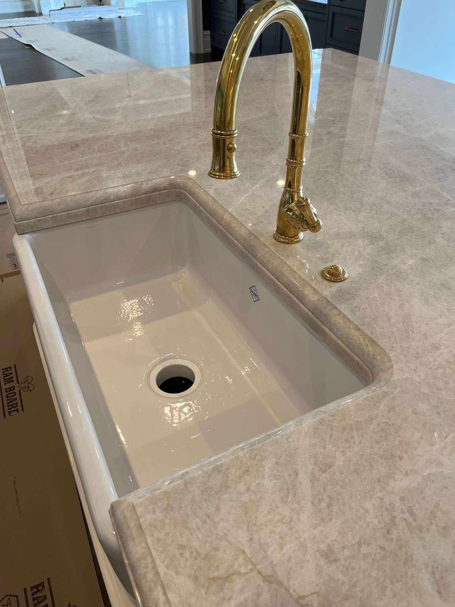 Mitered apron marble counter brass faucet Columbus